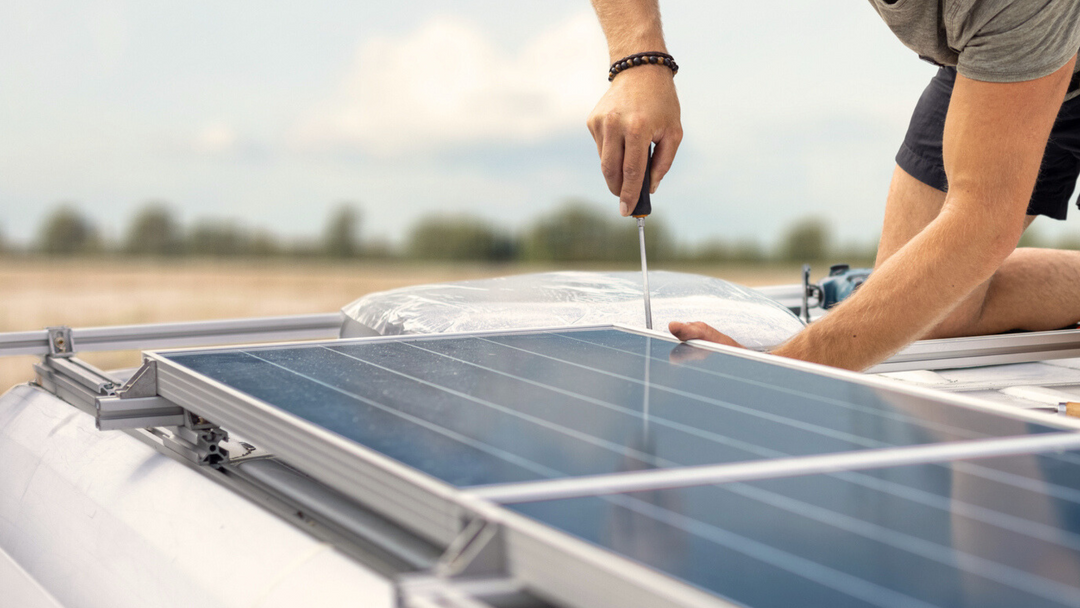 Installing solar panels on the roof of van